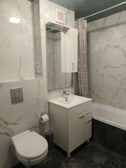 Ap. 2 cam,decomandat,et. 1/4,renovat modern,centrala proprie,an constr.1978. - 10