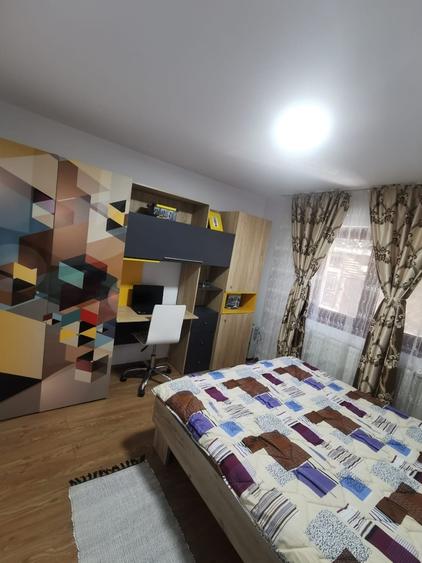 Nehoiu, centru, strada N. Costache, bloc A6, ap. 2, parter - 4