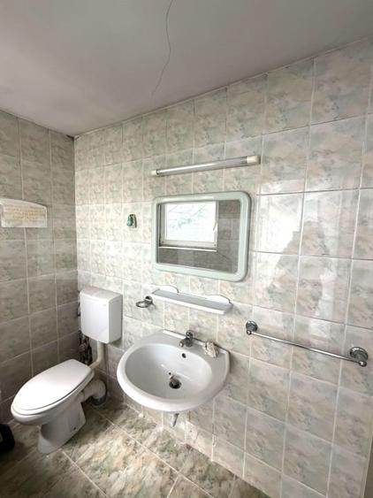 Casă individuală cu 4 camere cu Canalizare în Central