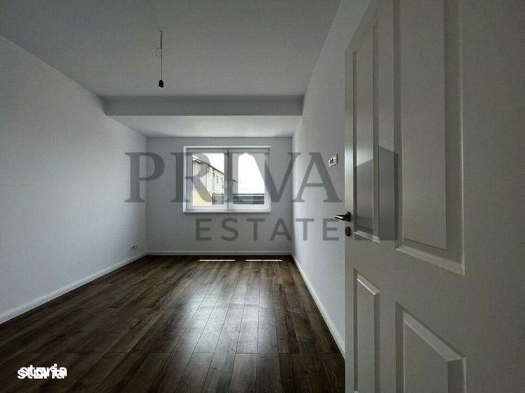 1/2 Duplex 124 mp utili + 330 curte. Dormitor parter,Bucatarie inchisa - 10