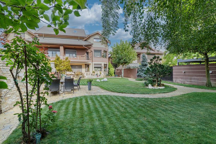 Casă premiată, finisaje premium, curte superbă – 700 mp teren