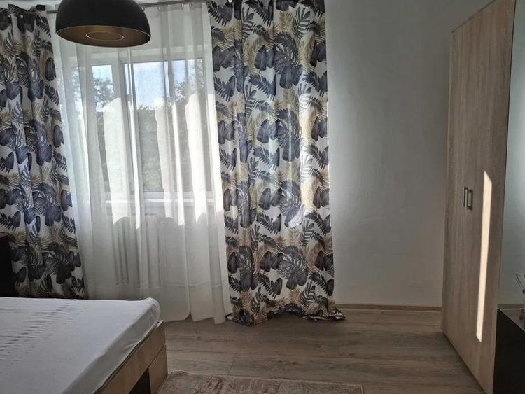 Apartament cu 2 camere semidecomandat, mobilat în Podu Roș