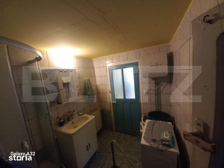 Casă cu 4 camere cu Teren 2500 Mp în Central