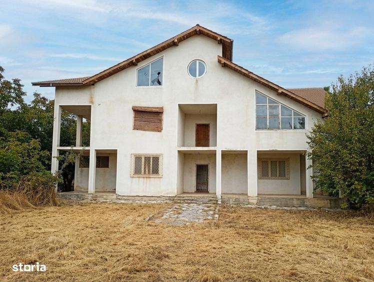 Casă cu 4 camere în Potlogi
