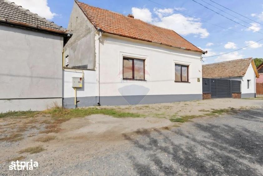 Casă cu 4 camere cu Teren 850 Mp în Central