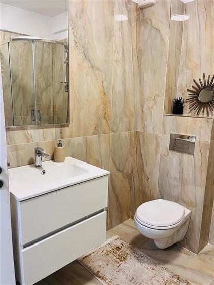 Apartament cu 2 camere semidecomandat, mobilat în Calea București