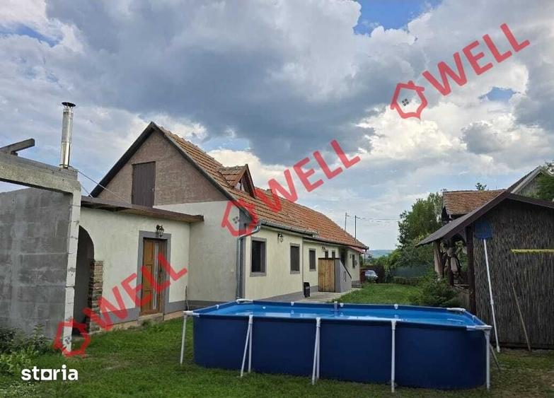 Casă cu 4 camere cu Teren 1102 Mp în Ozun