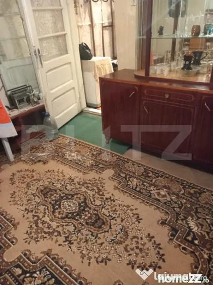 Casă cu 2 camere cu Teren 2000 Mp în Central