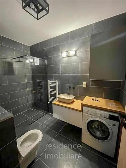 Apartament cu 2 camere semidecomandat, mobilat în Borhanci
