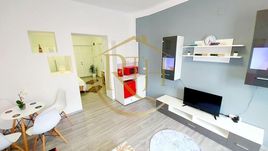 Apartament cu 2 camere semidecomandat, mobilat în Central