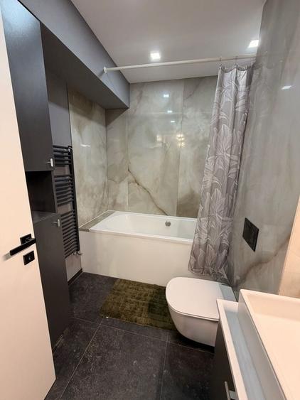 Apartament cu 2 camere semidecomandat, mobilat în Central