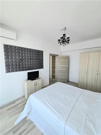 Apartament cu 2 camere semidecomandat, mobilat în Central