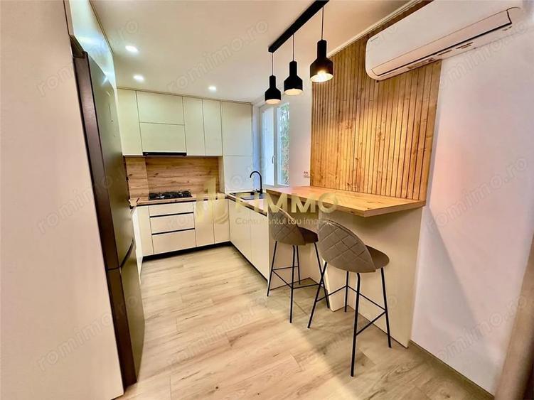 Apartament cu 2 camere, mobilat în Central