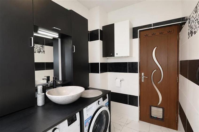 Apartament cu 2 camere decomandat în Tractorul
