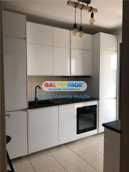 Apartament cu 3 camere semidecomandat, mobilat în Băneasa