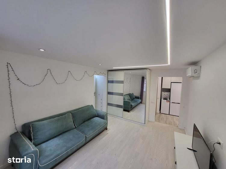 Apartament cu 2 camere semidecomandat, mobilat în P-ța Victoriei