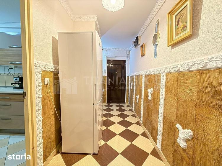 Apartament cu 2 camere, 2 bai, decomandat, etaj 1 - zona Racadau - 2