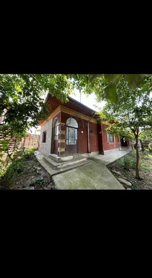 Casă cu 4 camere cu Teren 412 Mp în Comana