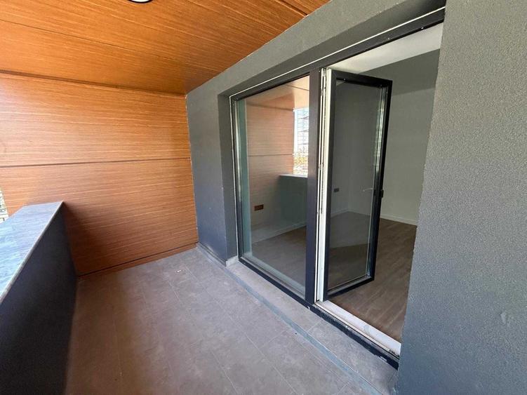 Apartament cu 3 camere decomandat în Cățelu
