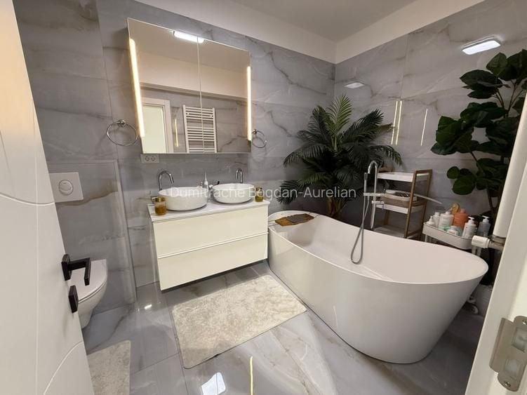 Apartament cu 4 camere decomandat în Cățelu
