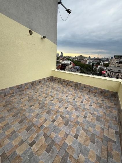 Garsonieră decomandată, mobilată în Calea Victoriei