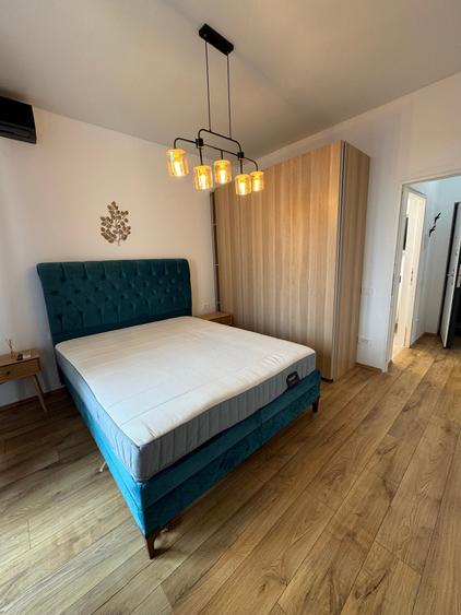 Apartament cu 2 camere semidecomandat, mobilat în Central