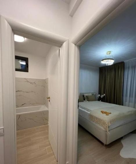 Apartament cu 2 camere semidecomandat, mobilat în 1 Mai