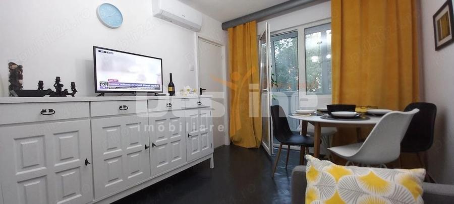 Apartament cu 3 camere semidecomandat, mobilat în Universitate