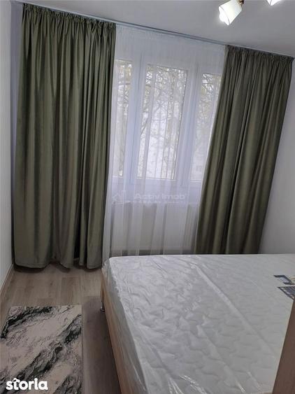 Apartament cu 3 camere semidecomandat, mobilat în Rahova