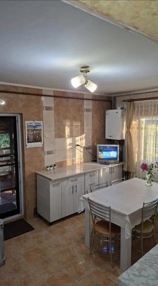 Casă cu Teren 1000 Mp în Central