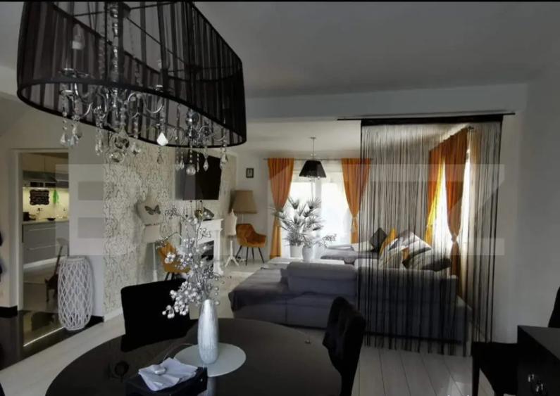 Casa eleganta, cu rafinament ?i intimitate un camin - 2