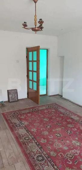 Casa cu 3 camere, bucatarie si baie, 105 mp ?i un teren de 1900 mp - 4