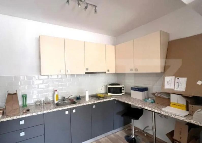 Apartament 2 camere si gradina, parcare subterana, zona str. - 1