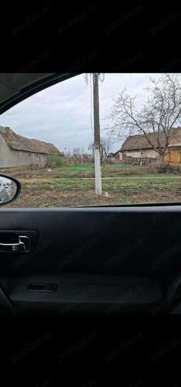 Vand teren de casa in Lovrin , pe drumul Principal cu toate Utilitatile la strada - 1