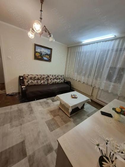 Vand apt..2cam . semidecomandat bloc 4 etaje ,etaj intermediar - 3