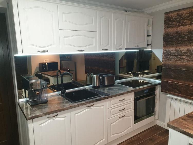 Garsoniera superfinisata si mobilata lux - langa str. Sforii - 54