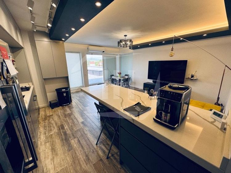 Apartament cu 3 camere, terasa de 135 m, parcare