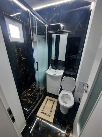 Apartament cu 2 camere, etajul 3/4, zona Podu Ros - 9