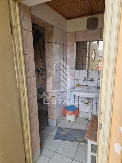 Casa familiala cu spatiu comercial si garaj P+1E+M 720 Mp - 59