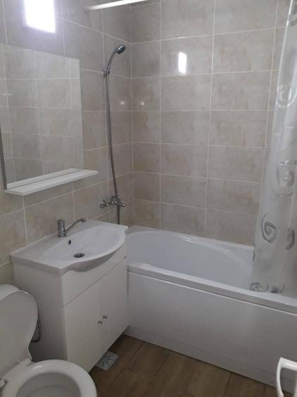 Apartament cu 2 camere semidecomandat în Podu Roș