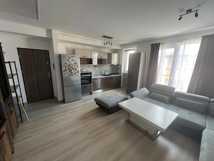 Nou. 57 mp utili. Mobilat si utilat. Asfalt. Zona Braytim - pozitie excelenta - 9