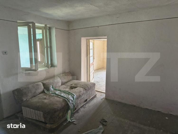 Casă cu 2 camere cu Teren 1200 Mp în Nord