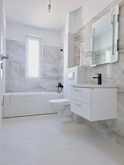 Bloc nou. Etajul 1. Bucatarie inchisa. Decomandat. - 2