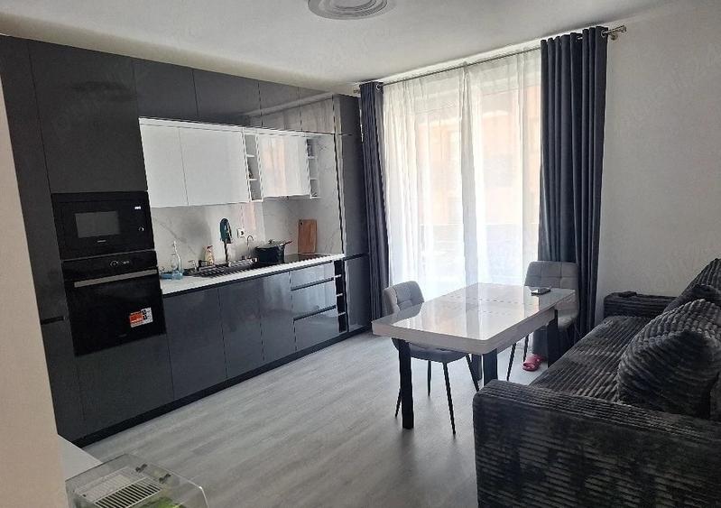 Apartament cu 2 camere semidecomandat, mobilat în Chinteni