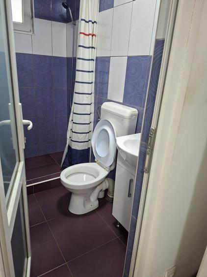 Garsonieră decomandată în Titan