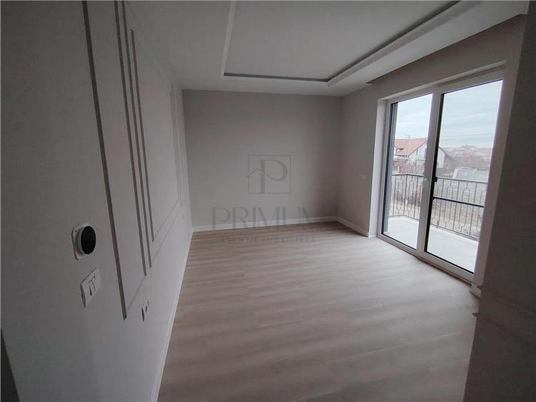 Casa individuala - zona superba - teren 522 mp- toate utilitatile - carport. - 11