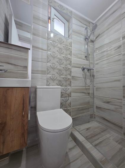 Casă individuală cu 4 camere cu Canalizare în Giulești
