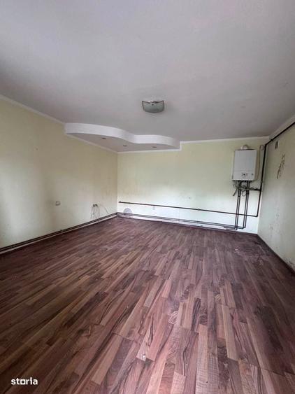 Casă cu 3 camere decomandat în Central
