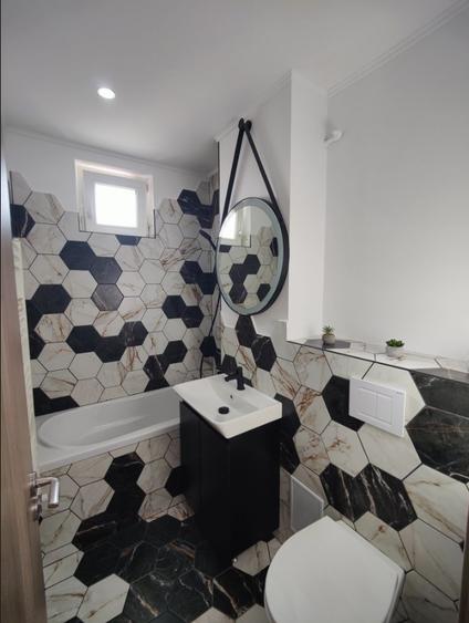 Apartament cu 2 camere semidecomandat, mobilat în Centrul Civic