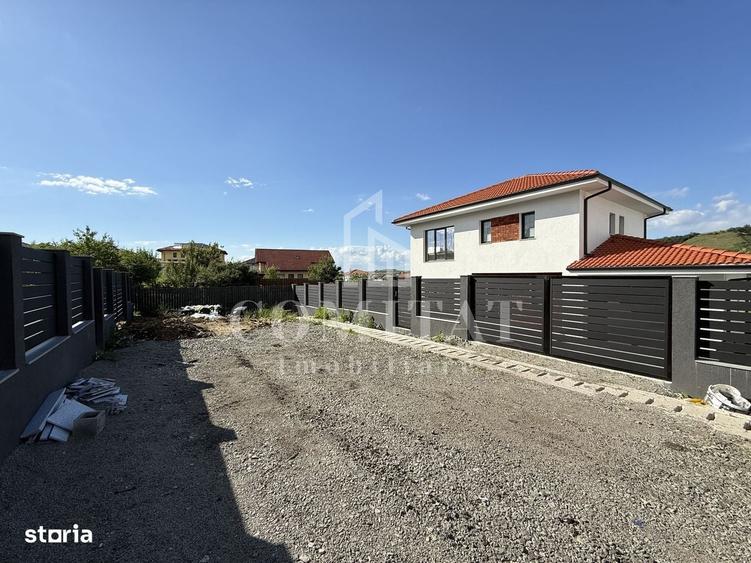 Casă cu 4 camere în Chinteni